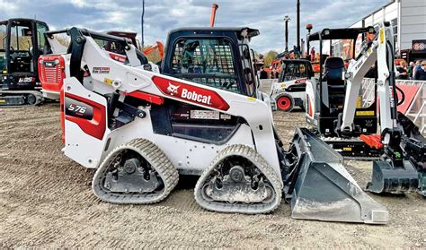 bobcat quad track skid steer price|aftermarket tracks for skid steer.